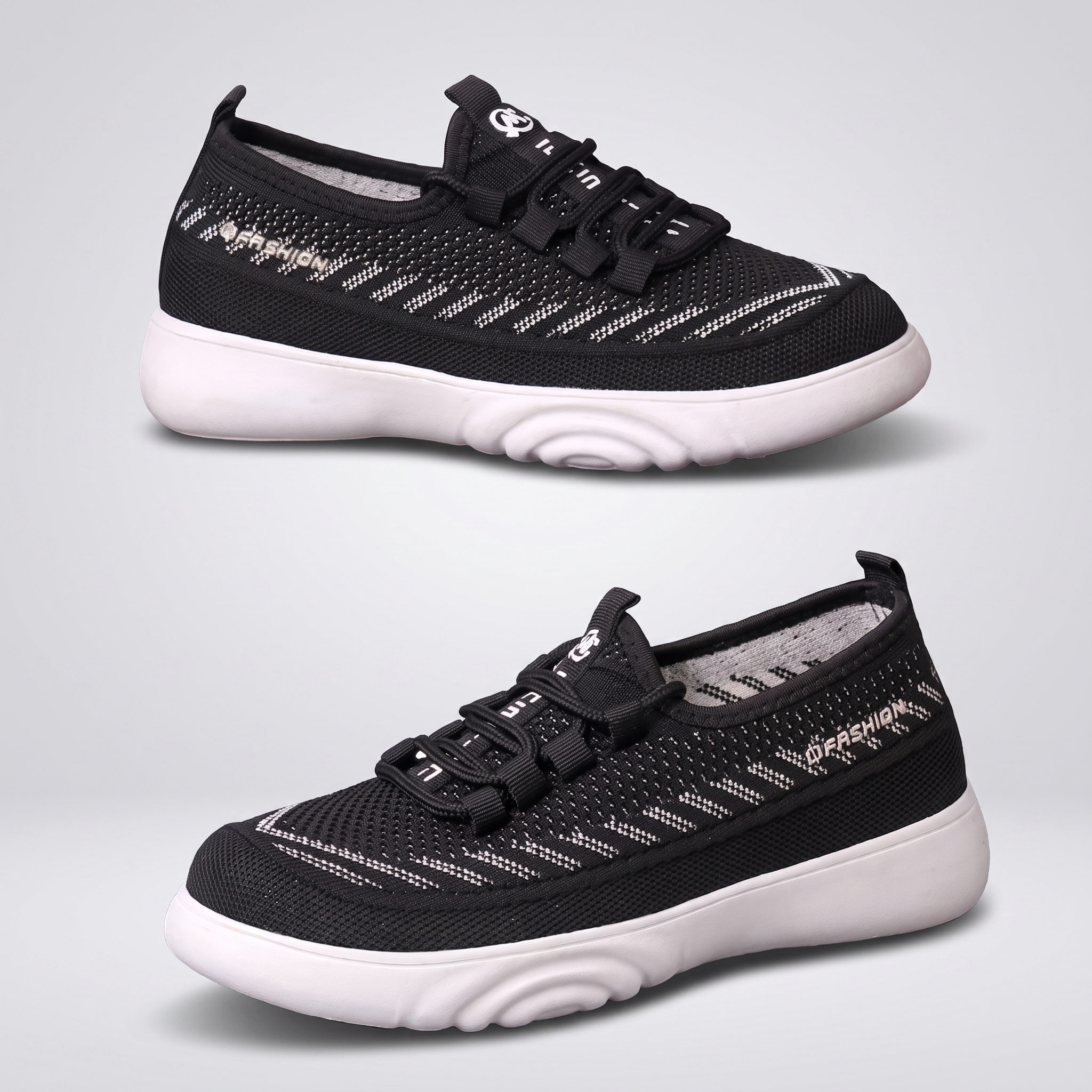 Annette | Slip-On Knit Sneakers with Elastic Ties Black, photo studio