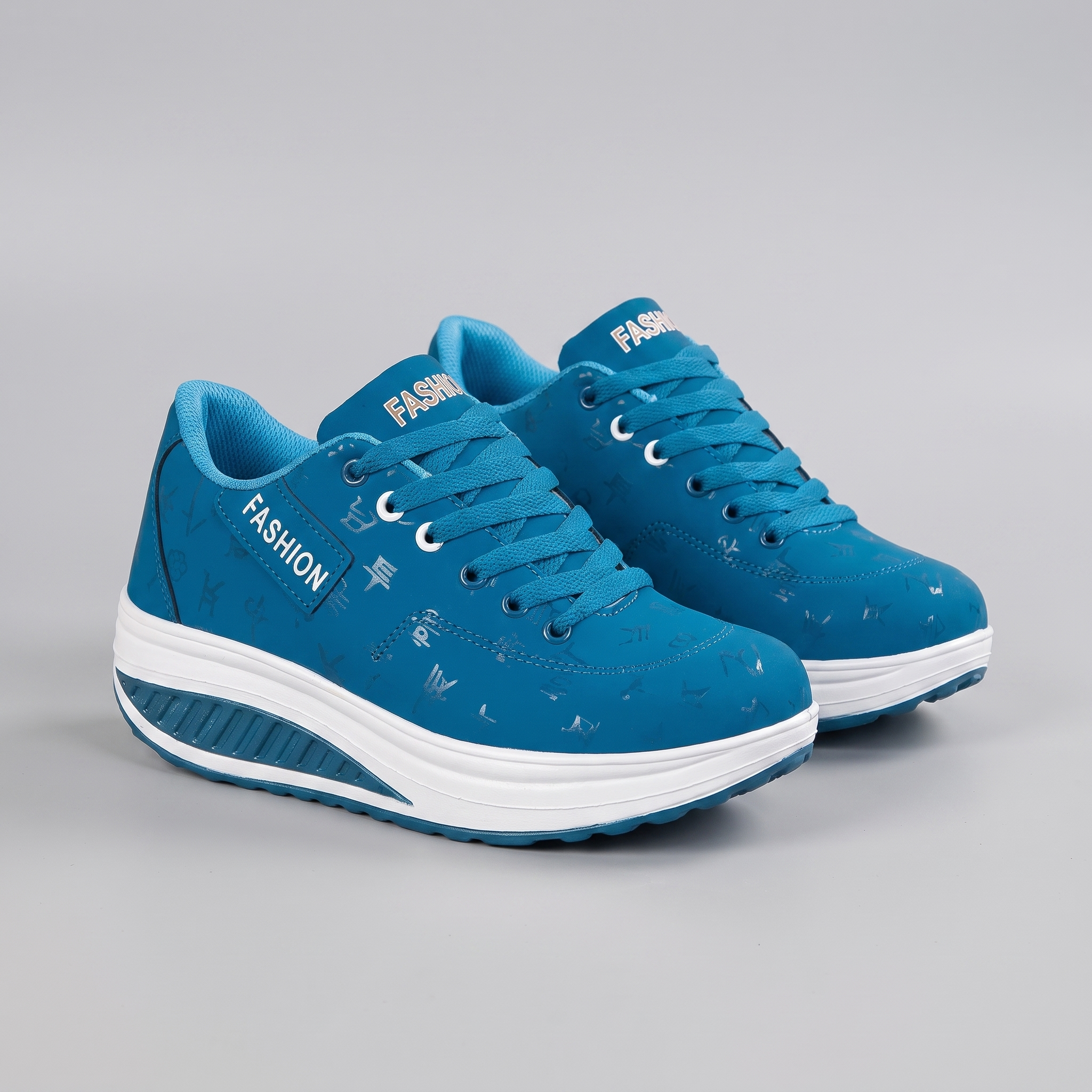 Chloe | Platform Sneakers with a Curved Sole Blue, photo studio