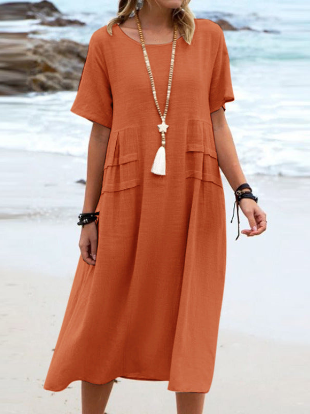 Carys | Flowy Comfy Dress Orange, studio photo