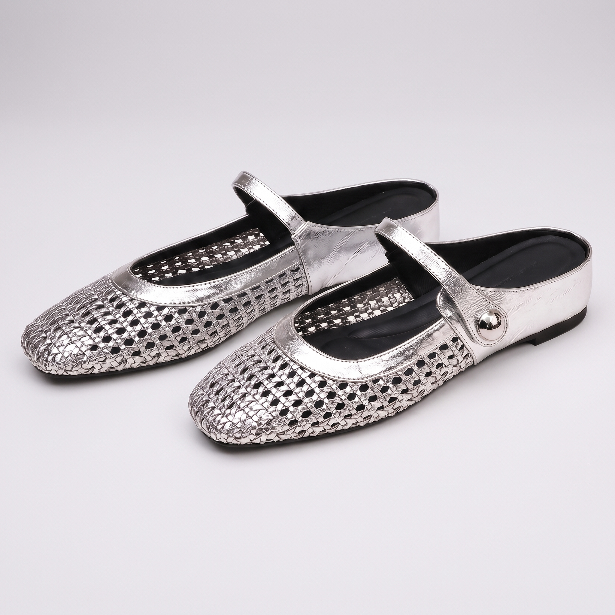 Kirkstone | Woven Mules with a Button Strap Silver, photo studio