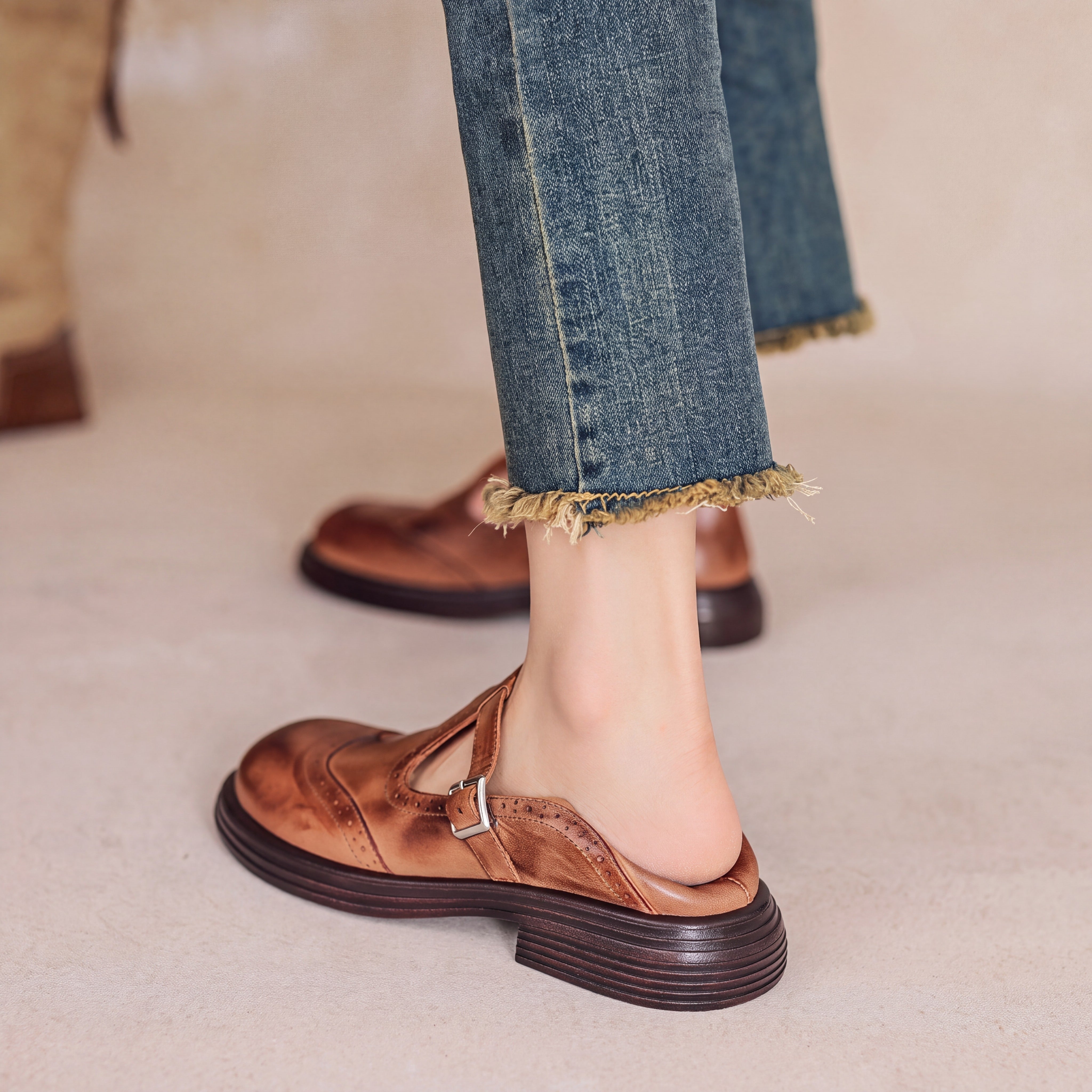 Perforated Wingtip Leather Mary Janes Brown, photo studio