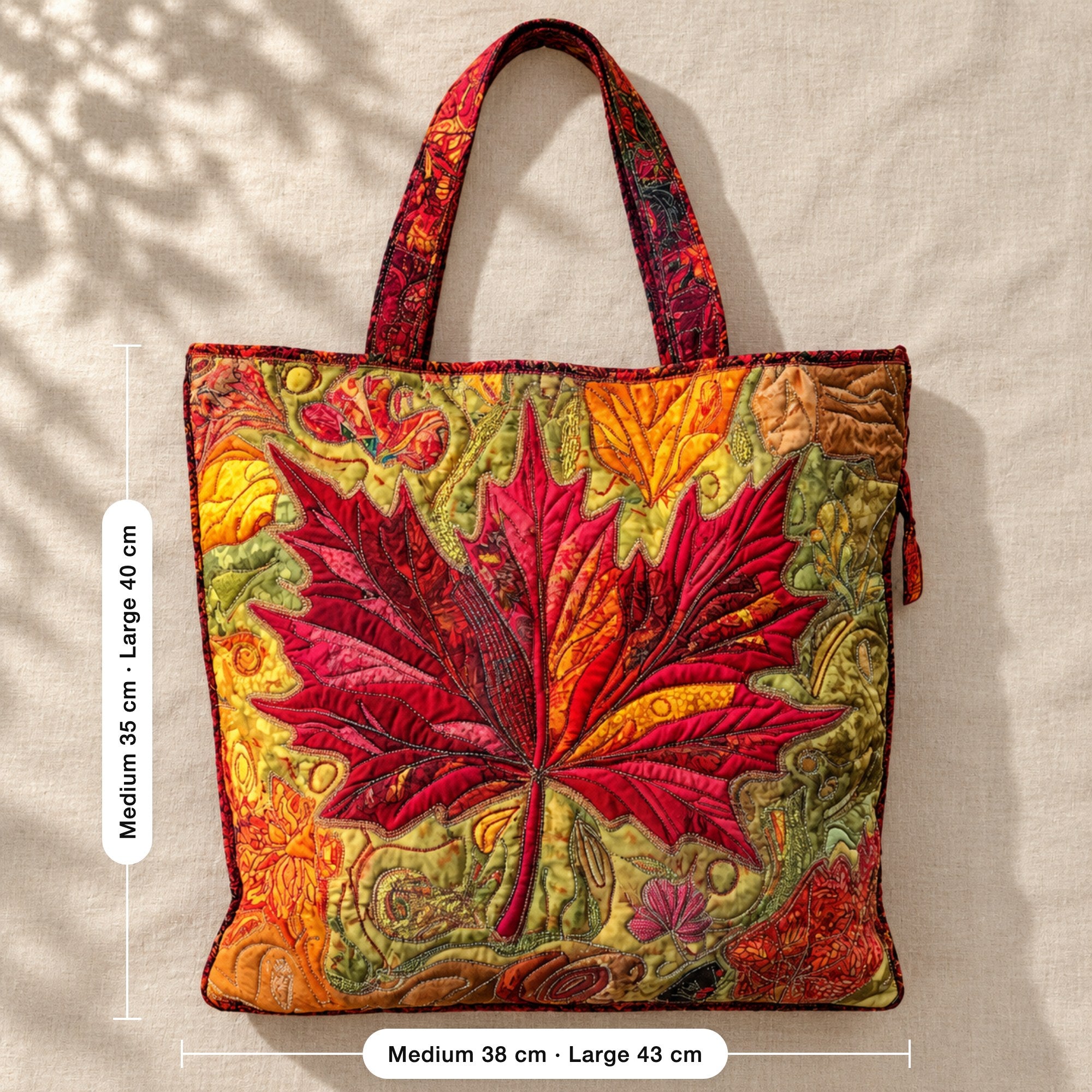 Gwenno | Quilted Shoulder Tote with an Autumn Maple Leaf, flat lay with sizes
