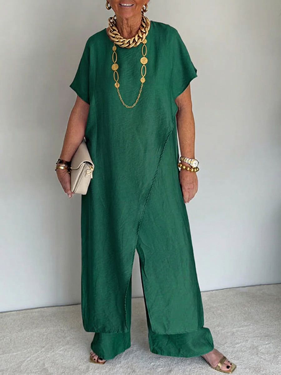 Greer | Draped Asymmetric Dress Green, studio photo