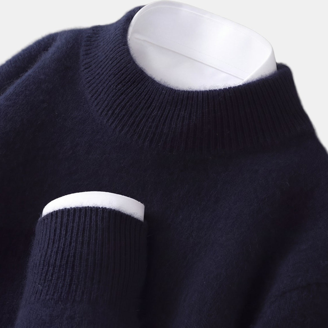 Sand High-Neck Jumper Dark Blue, studio photo